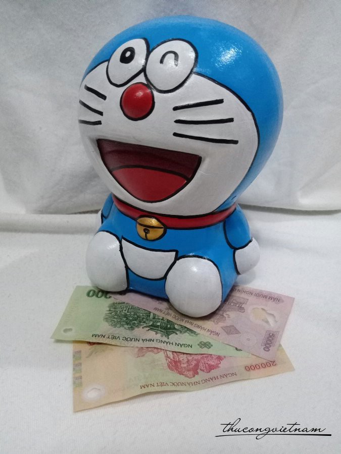 Heo đất Đoraemon ngồi 